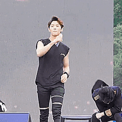 Pentagon Hongseok Displaying His Abs Kpop GIF