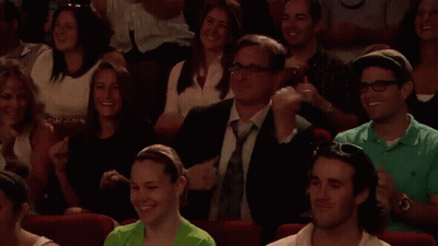 People Applauding Show In Theater GIF