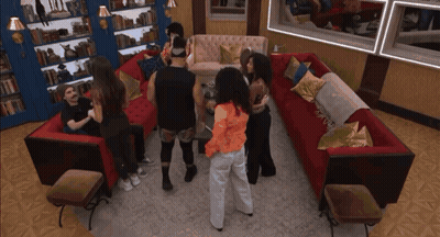 People Around Couch In Living Room GIF