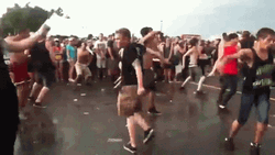People Crazy Dancing In Wet Mosh Pit GIF