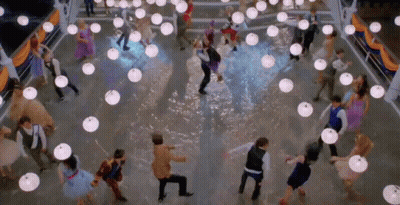 People Dancing Among Lanterns GIF