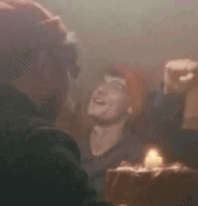 People Dancing Around Candle