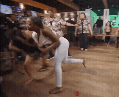 People Dancing In Bar Woman Holding Butt GIF