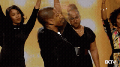People Dancing In Front Of Bet Logo GIF