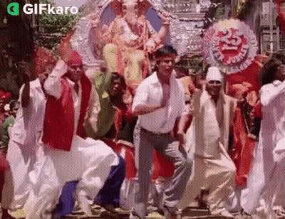 People Dancing In Front Of Ganesha Statue GIF