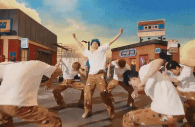 People Dancing In Front Of Golden Inn GIF