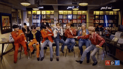 People Dancing In Front Of NPR Sign GIF