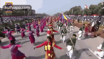 People Dancing In Parade GIF