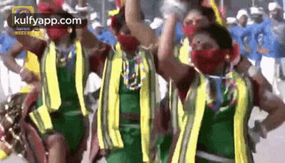 People Dancing In Parade With Kulfyapp.com Watermark GIF