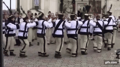 People Dancing In Traditional Costumes GIF