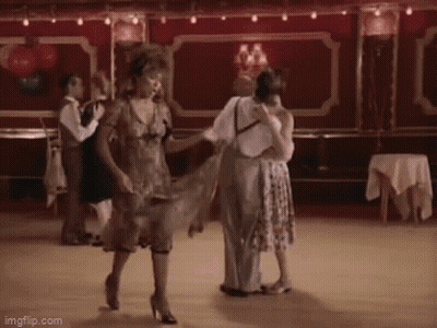 People Dancing On Dance Floor In Red Room GIF