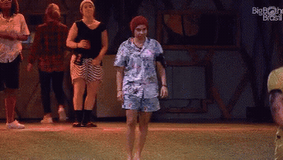 People Dancing On Stage With Big Brother Brasil Logo GIF