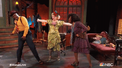 People Dancing On Stage With NBC Logo GIF