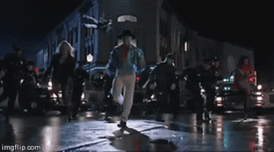 People Dancing On Wet Street Saying Imgflip.com GIF
