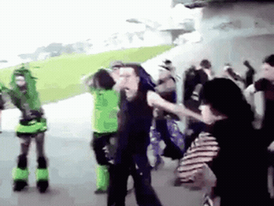 People Dancing, One In Green Top GIF