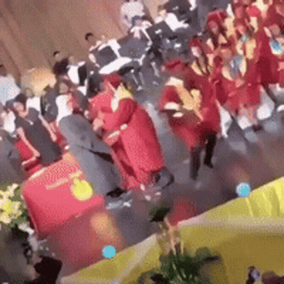 People Dancing With Balloons And Flowers GIF