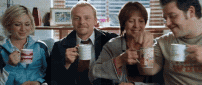 People Drinking Coffee and Smiling