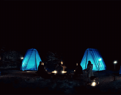 People Gathering Around Campfire GIF