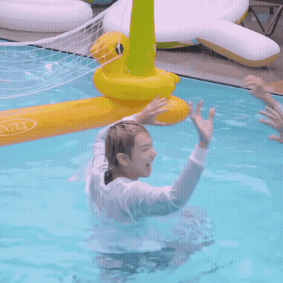 People Giving High Fives In Pool GIF