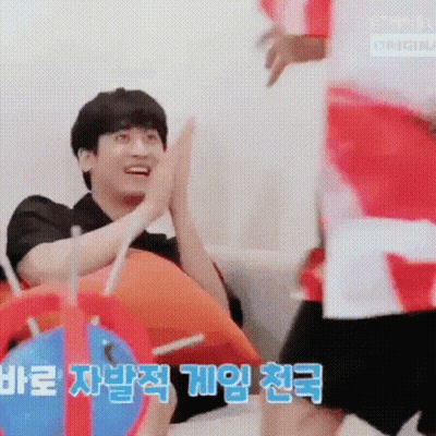 People High Fiving On Couch GIF
