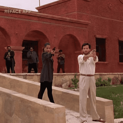 People Holding Guns At Reface App Building GIF
