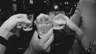 People Holding Shot Glasses GIF
