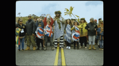 People Holding UK Flags GIF