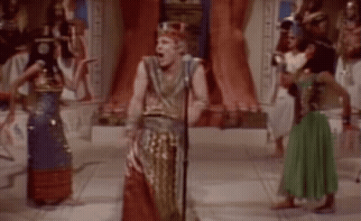 People In Ancient Egyptian Costumes Dancing GIF