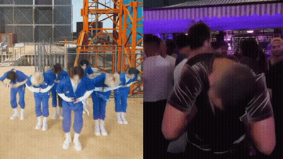 People In Blue Jumpsuits Dancing In Front Of Crane GIF