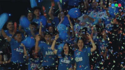 People In Blue Shirts Saying Flying Flowers GIF