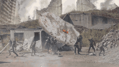 People In Front Of Building With Huge Explosion GIF