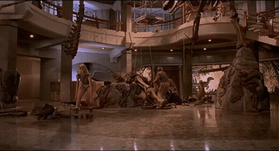 People In Front Of Dinosaur GIF