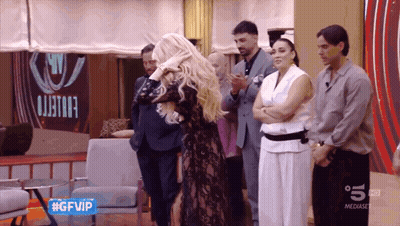People In Front Of GFVIP Sign GIF
