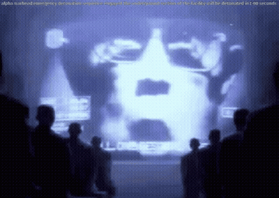 People in Front of Screen Saying Alpha Manhead Emergency Demolition