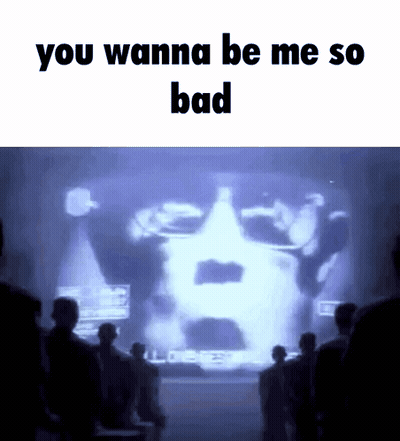 People In Front Of Screen With Man's Face GIF