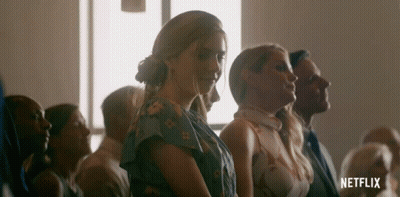 People In Room With Netflix Logo GIF