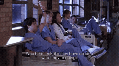 People In Scrubs Sitting In Chairs GIF