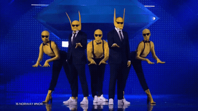 People In Suits And Masks Dancing Norway GIF