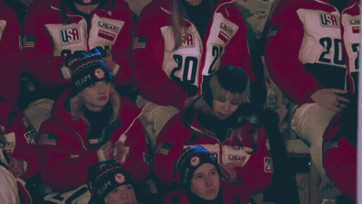 People In USA Jackets And Hats Sitting GIF