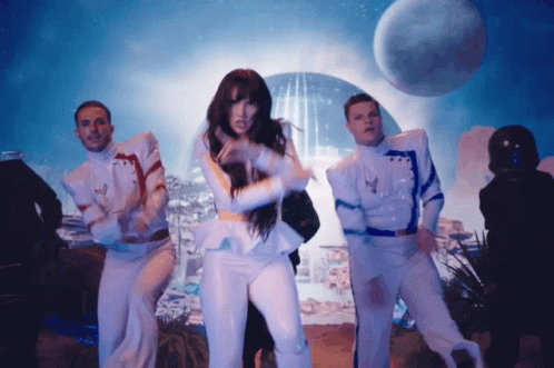 People In White Jumpsuits Dancing GIF