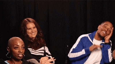 People Laughing Covering Faces With Hands GIF