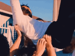 People Lifting Guy In Mosh Pit GIF