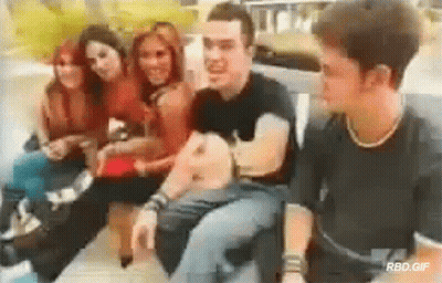 People On Bench One In Black Shirt GIF
