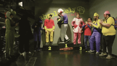 People On Podium Saying Absolute Karting GIF