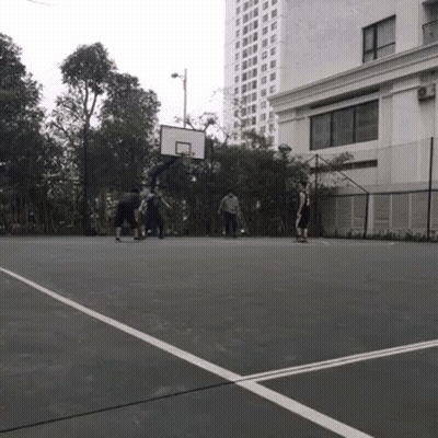 People Playing Basketball Near Building GIF