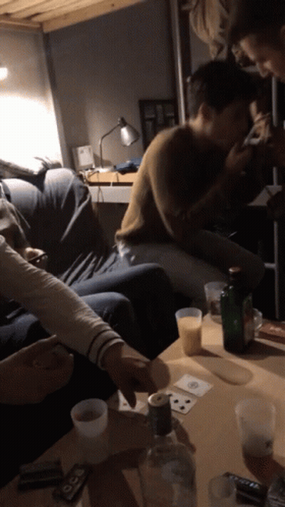 People Playing Cards With Vodka GIF