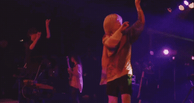 People Playing Instruments On Stage GIF