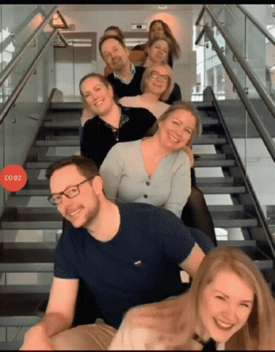 People Posing On Stairs With Red Circle Co.02 GIF