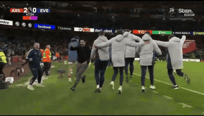 People Running On Soccer Field With Facebook Guinness TCL GIF