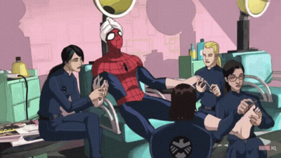 People Sitting Around Man In Spider-Man Costume GIF